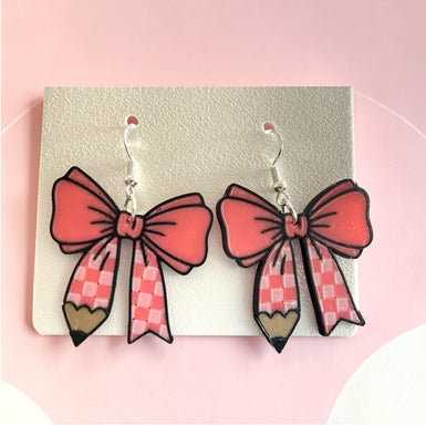 Bow pencil earrings